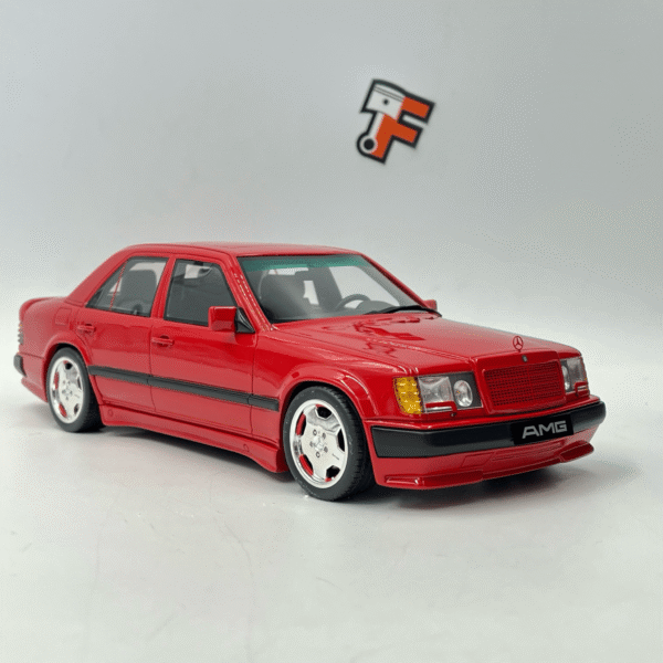 Miniature Mercedes 300E 6.0 AMG Signal Red 1987 1/18 vendue en Suisse