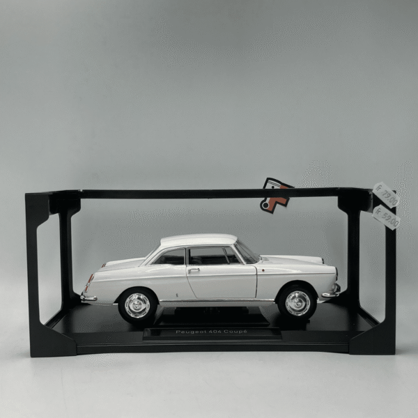 Miniature Peugeot 404 Coupé 1967 Blanc Arosa Norev 1/18 vendue en Suisse
