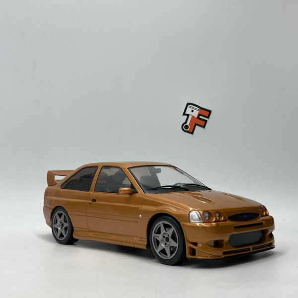 Miniature Ford Escort Cosworth Bronze 1998 au 1/18 vendue en Suisse