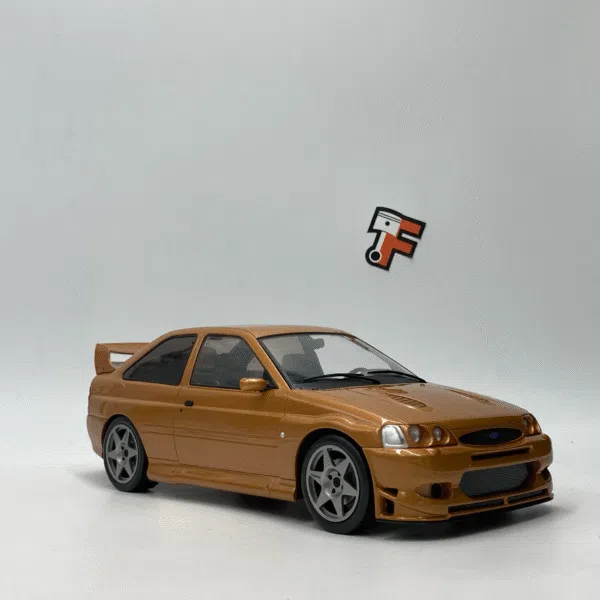 Miniature Ford Escort Cosworth Bronze 1998 au 1/18 vendue en Suisse