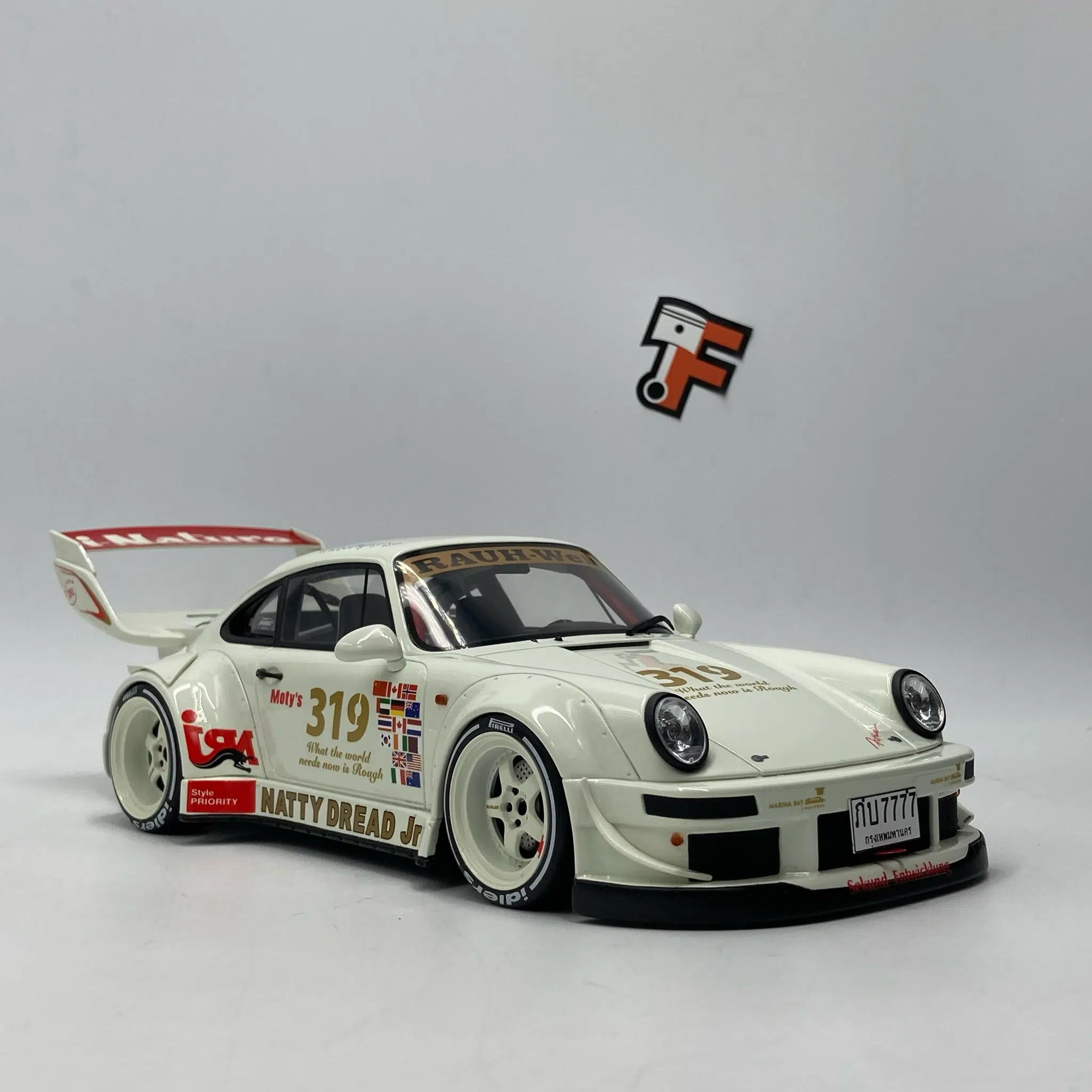 Miniature Porsche 911 964 RWB Natty Dread Jr. White 2024 GT Spirit 1/18 vendue en Suisse