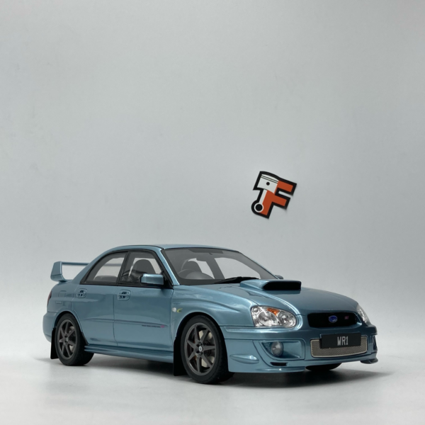 Miniature Subaru Impreza WRX STI WR1 Solberg Ice Blue 2004 1/18 vendue en Suisse