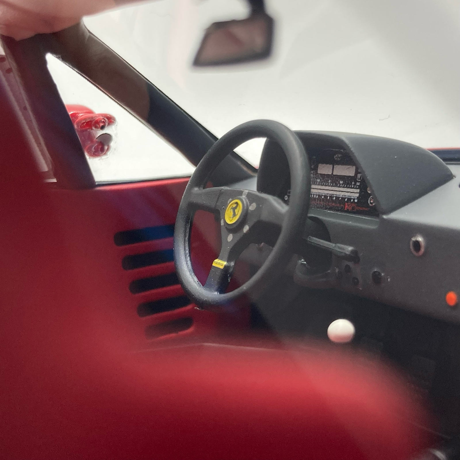 Miniature Ferrari F40 LM Rosso Corsa 1989 vendue en Suisse