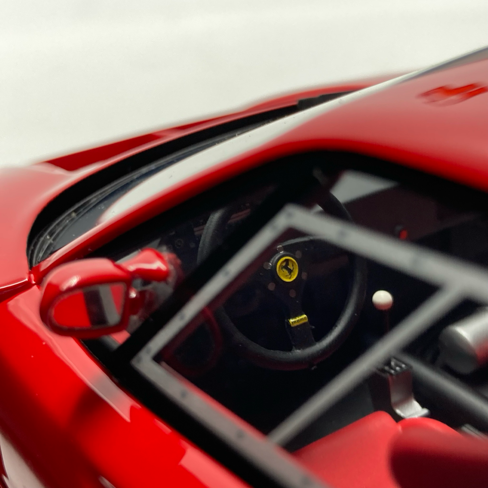 Miniature Ferrari F40 LM Rosso Corsa 1989 vendue en Suisse