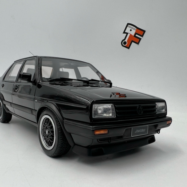 Miniature VW Jetta MK II 1987 noire 1/18 vendue en Suisse