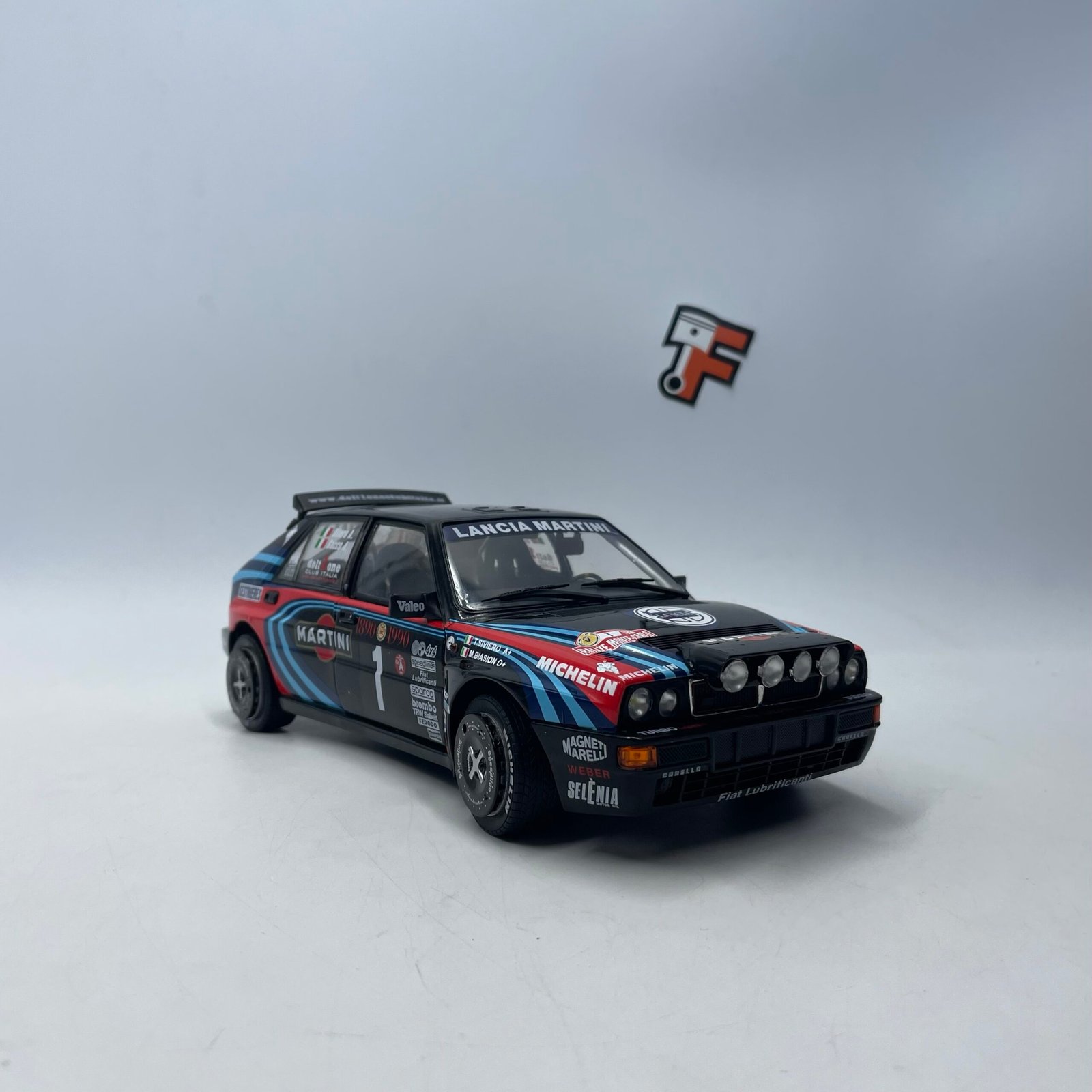 Miniature Lancia Delta HF Integrale Monte Carlo 1990 A Sacco Solido 1/18 vendue en Suisse