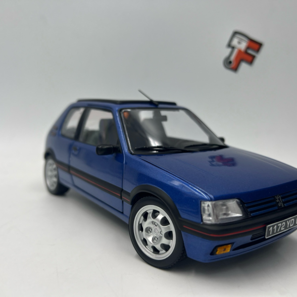 Miniature Peugeot 205 GTI 1.9 Miami Blue 1992 avec toit ouvrant vendue en Suisse