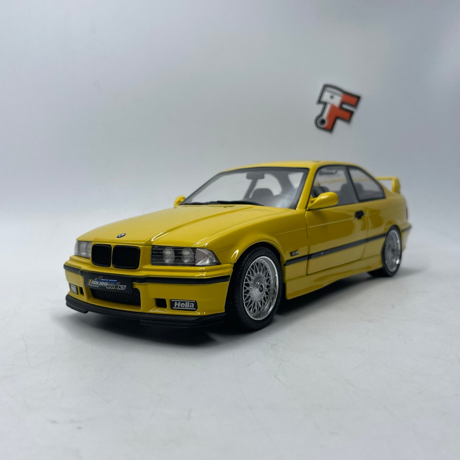 Miniature BMW M3 E36 Coupé Dakar Yellow 1991 1/18 vendue en Suisse