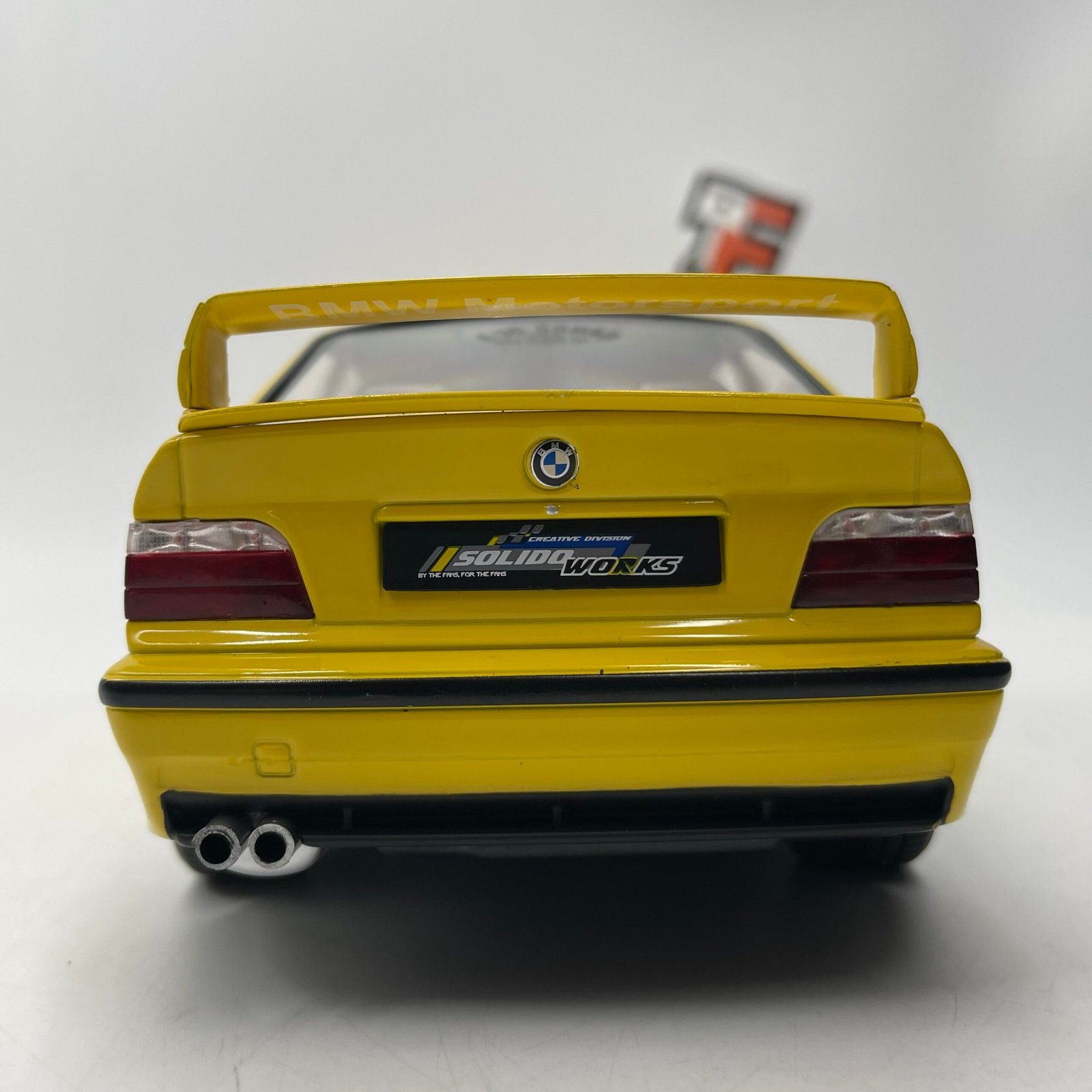 Miniature BMW M3 E36 Coupé Dakar Yellow 1991 1/18 vendue en Suisse