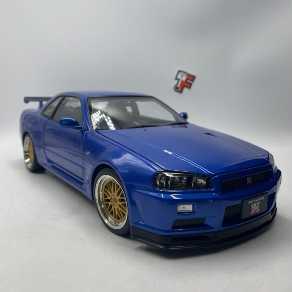 Miniature Nissan Skyline GT-R R34 V-Spec II BBS 2001 bleu métallique 1/12 vendue en Suisse