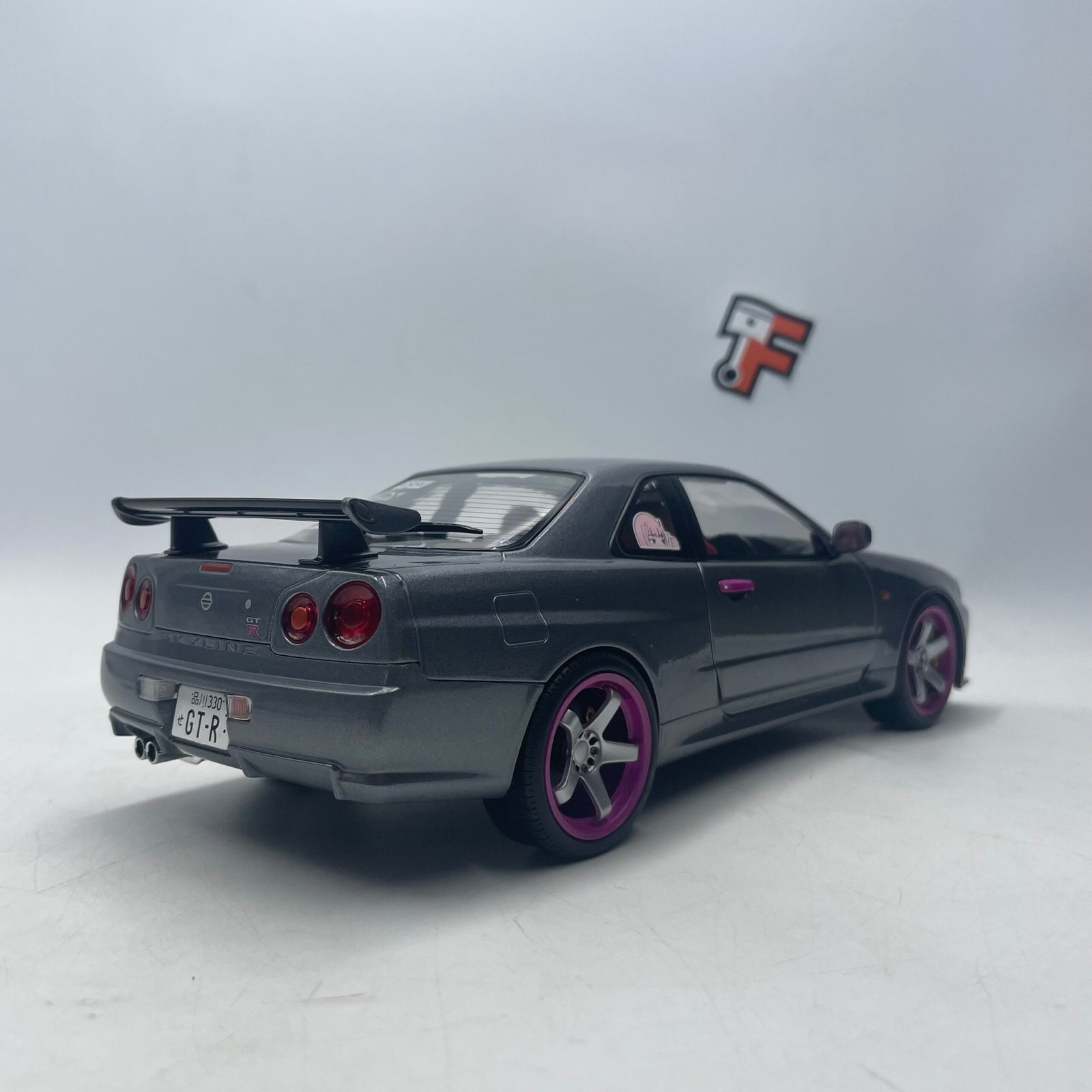 Nissan Skyline R34 GT-R 1999 Grey Purple 1/18 – Image 7